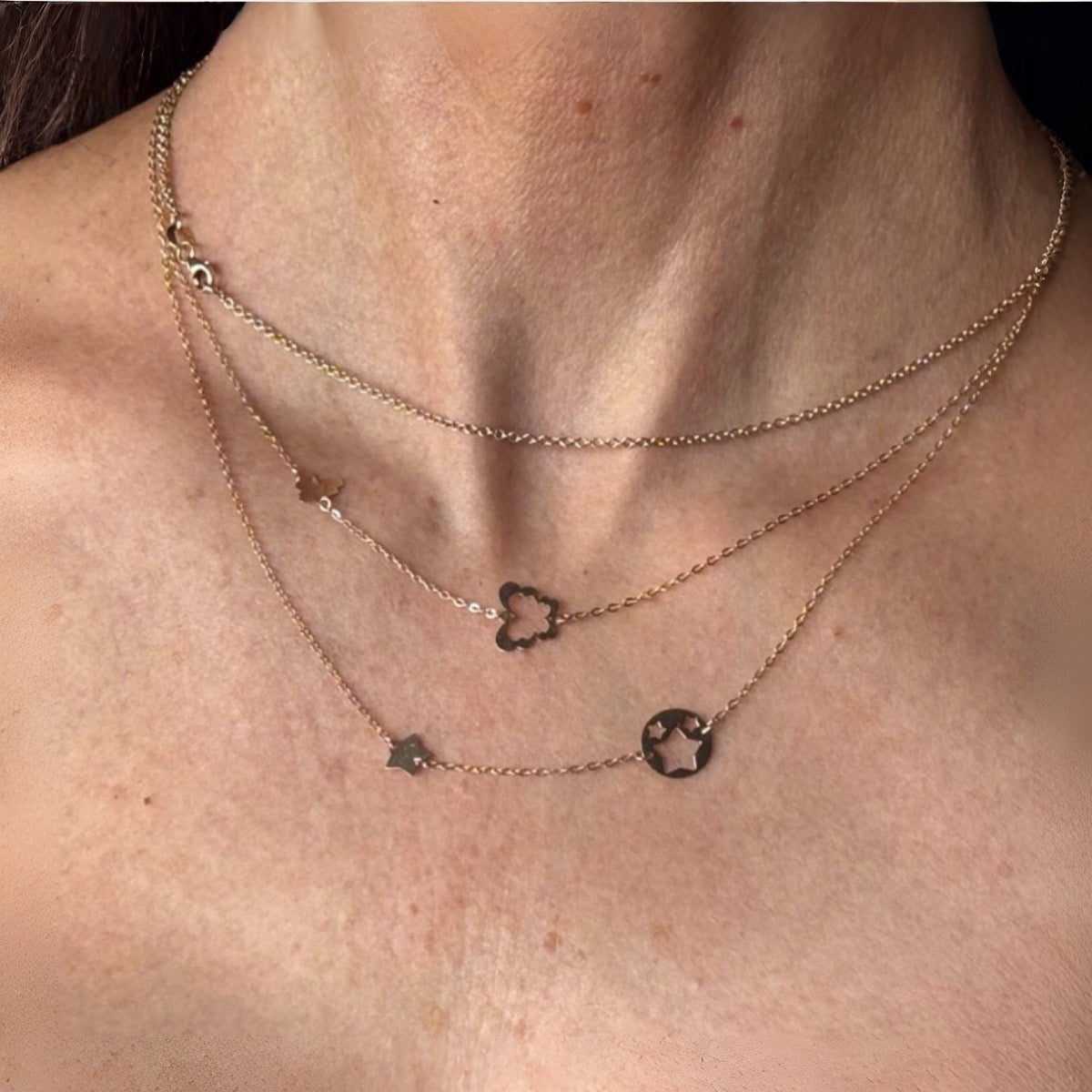 9ct gold star cut out charm necklace