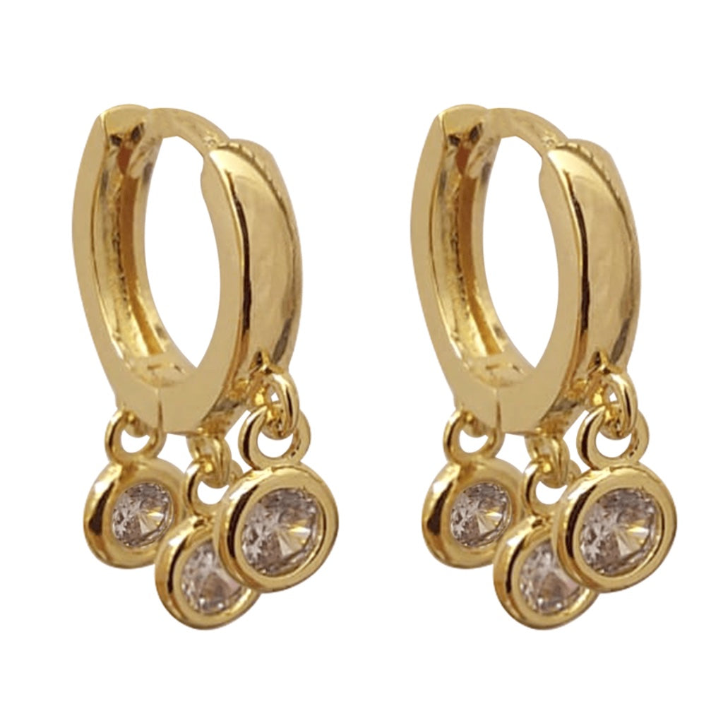 huggie earrings with three hanging charms with cubic zirconias