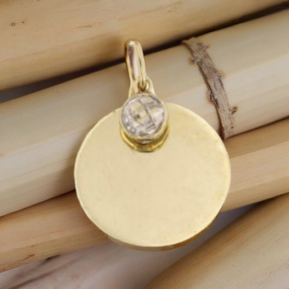 9kt yellow gold disc with cubic zirconia charm 