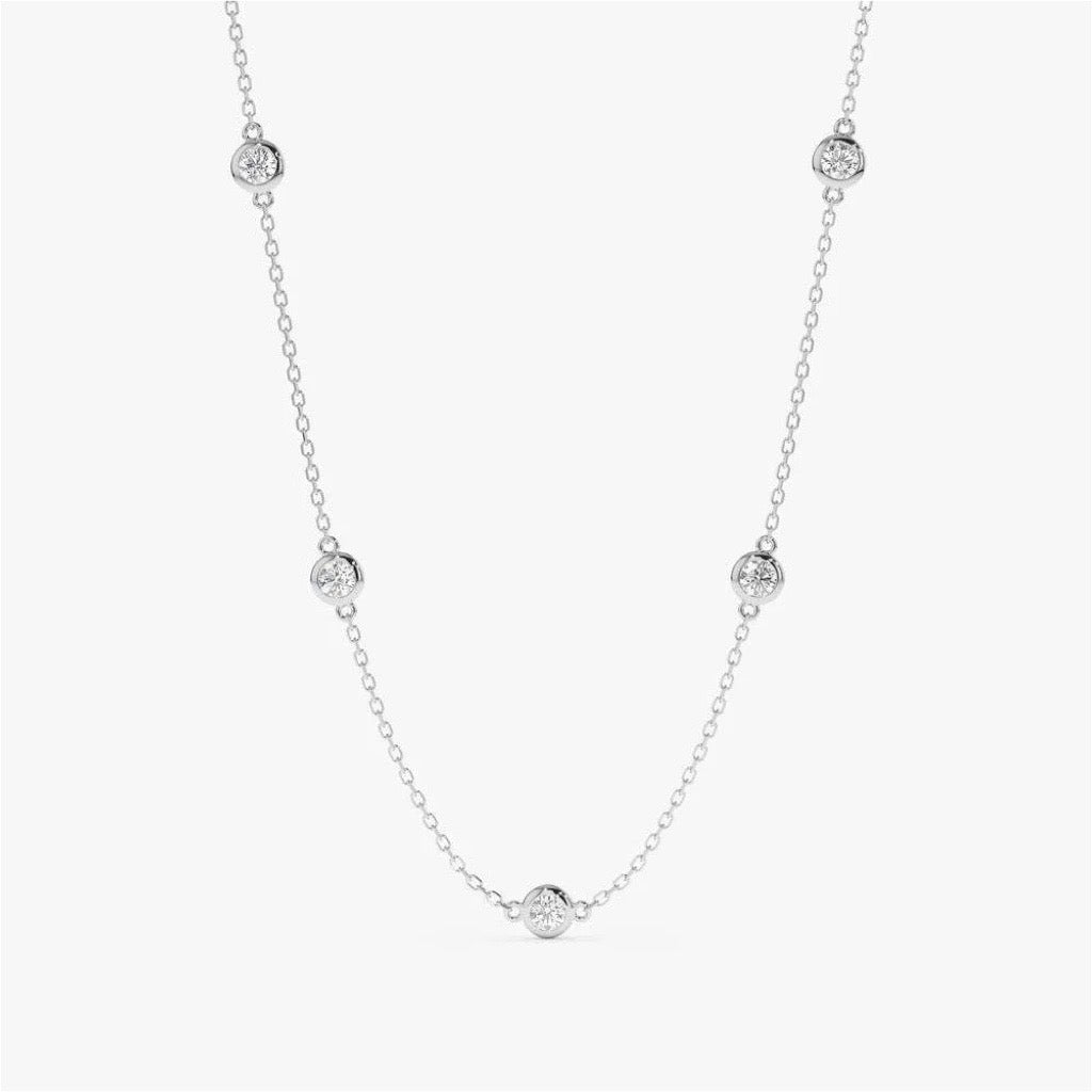 9kt white gold by the yard necklace with cubic zirconias in a bezel setting