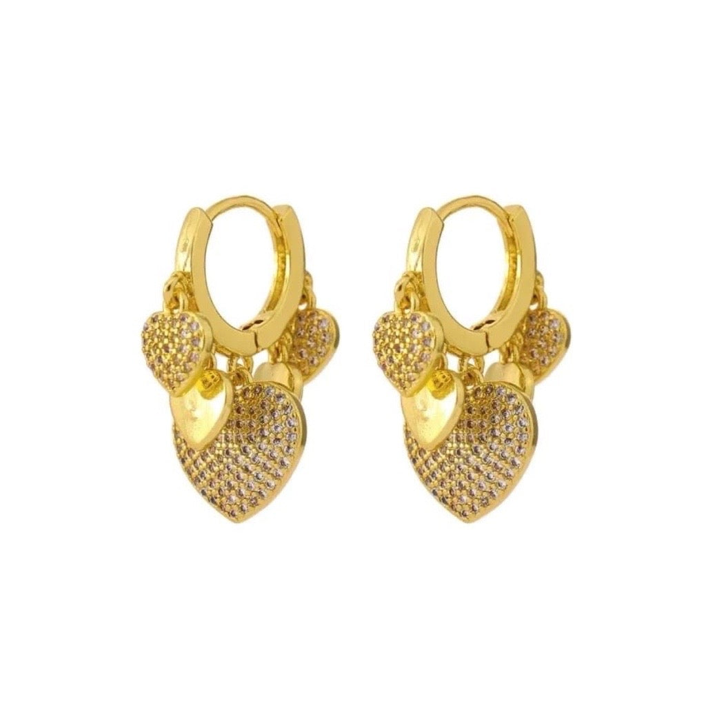 Heart Charm Huggie Earrings in gold with cubic zirconias
