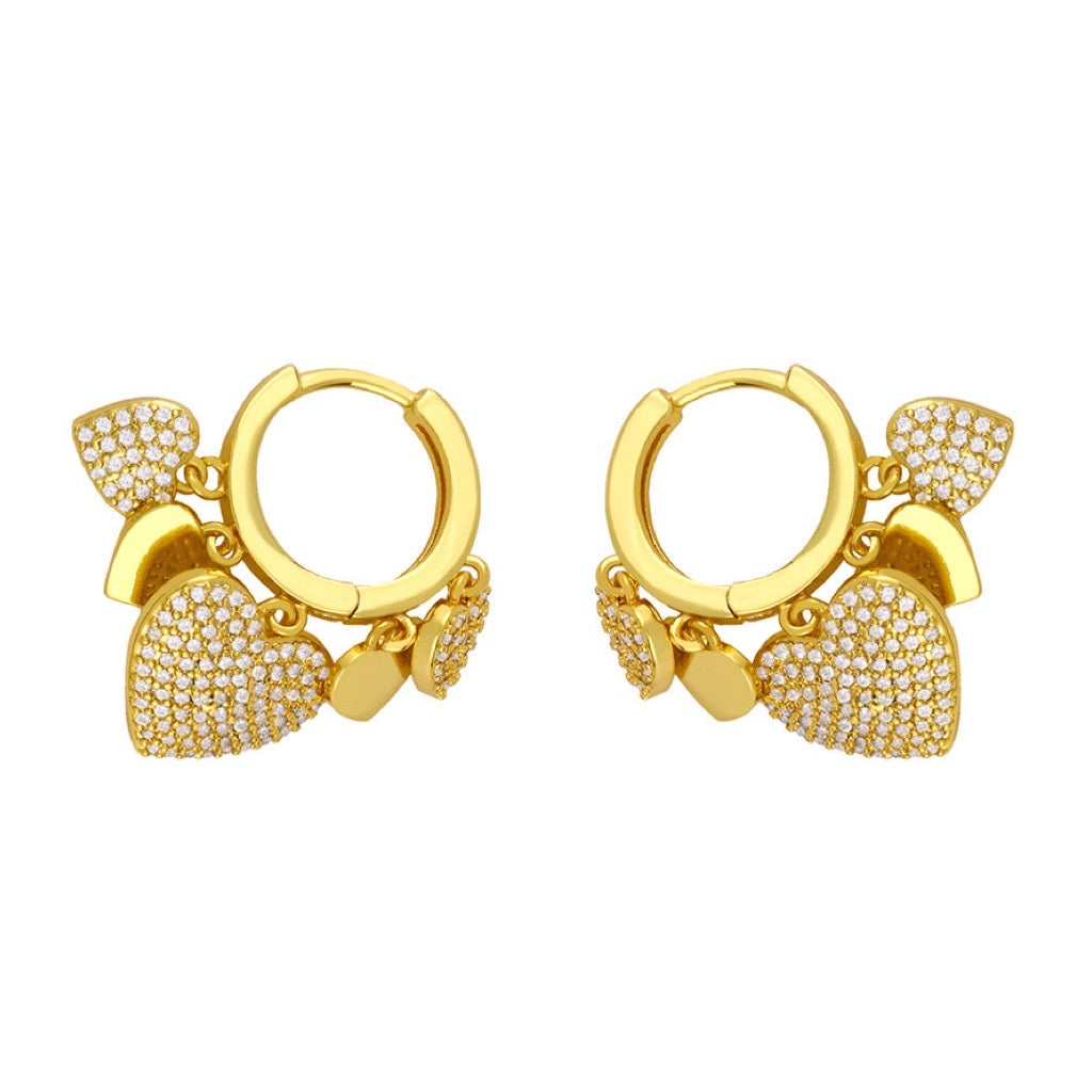 Heart Charm Huggie Earrings in gold with cubic zirconias