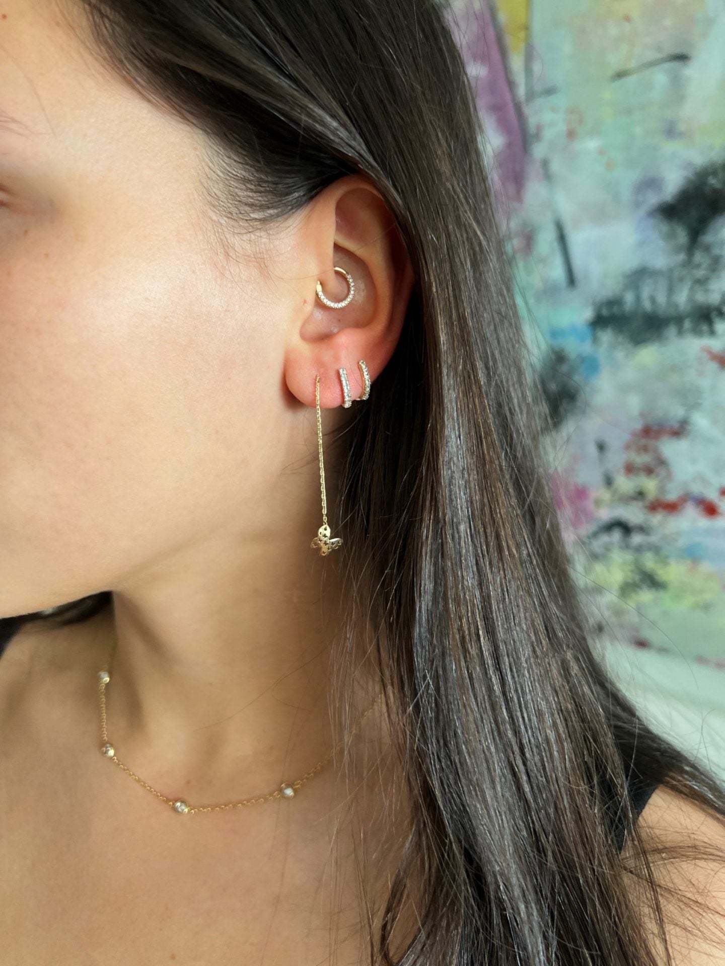 half round snug fit earrings in 9kt gold with cubic zirconias 