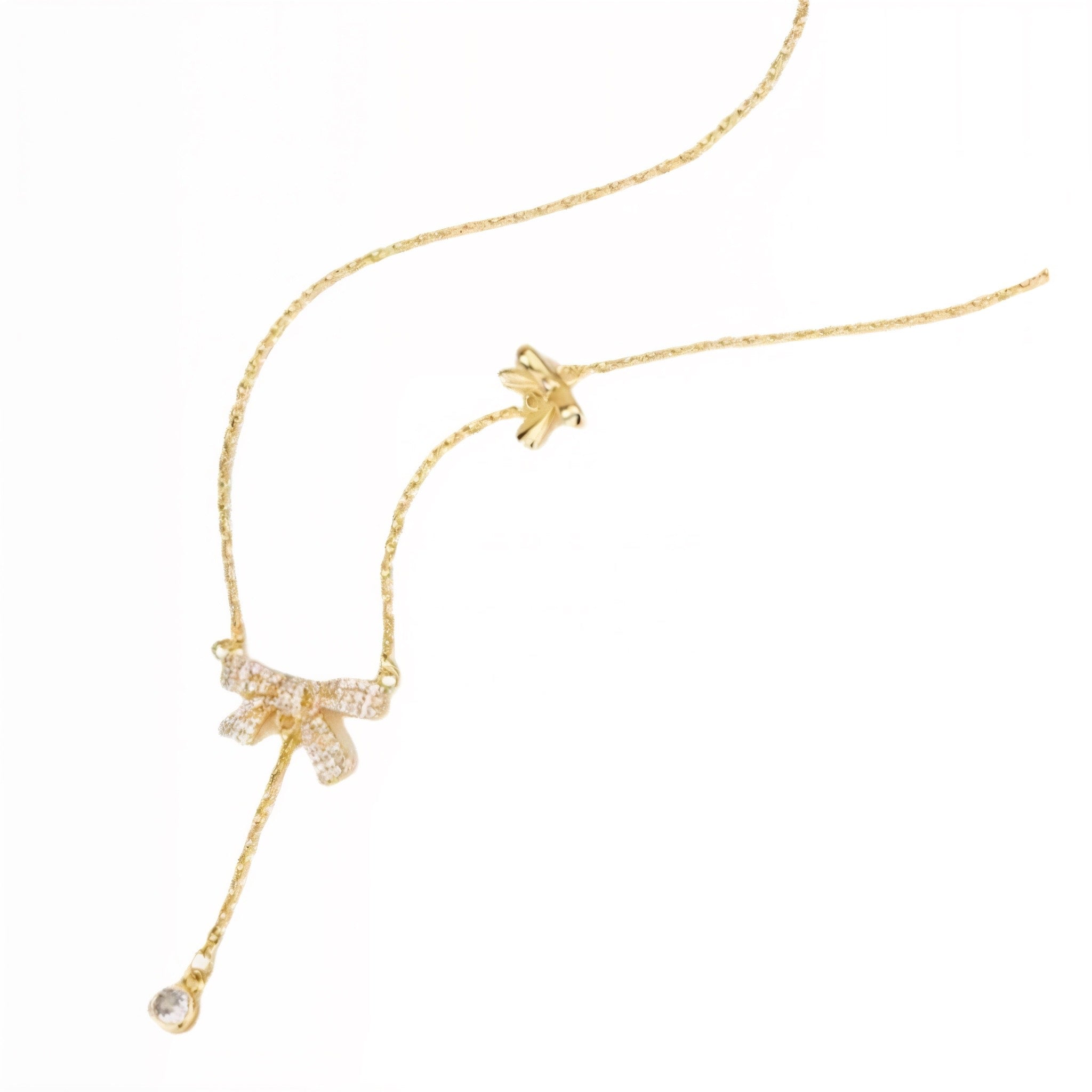 the bow necklace in gold plated with lariat cubic zirconia hanging charm