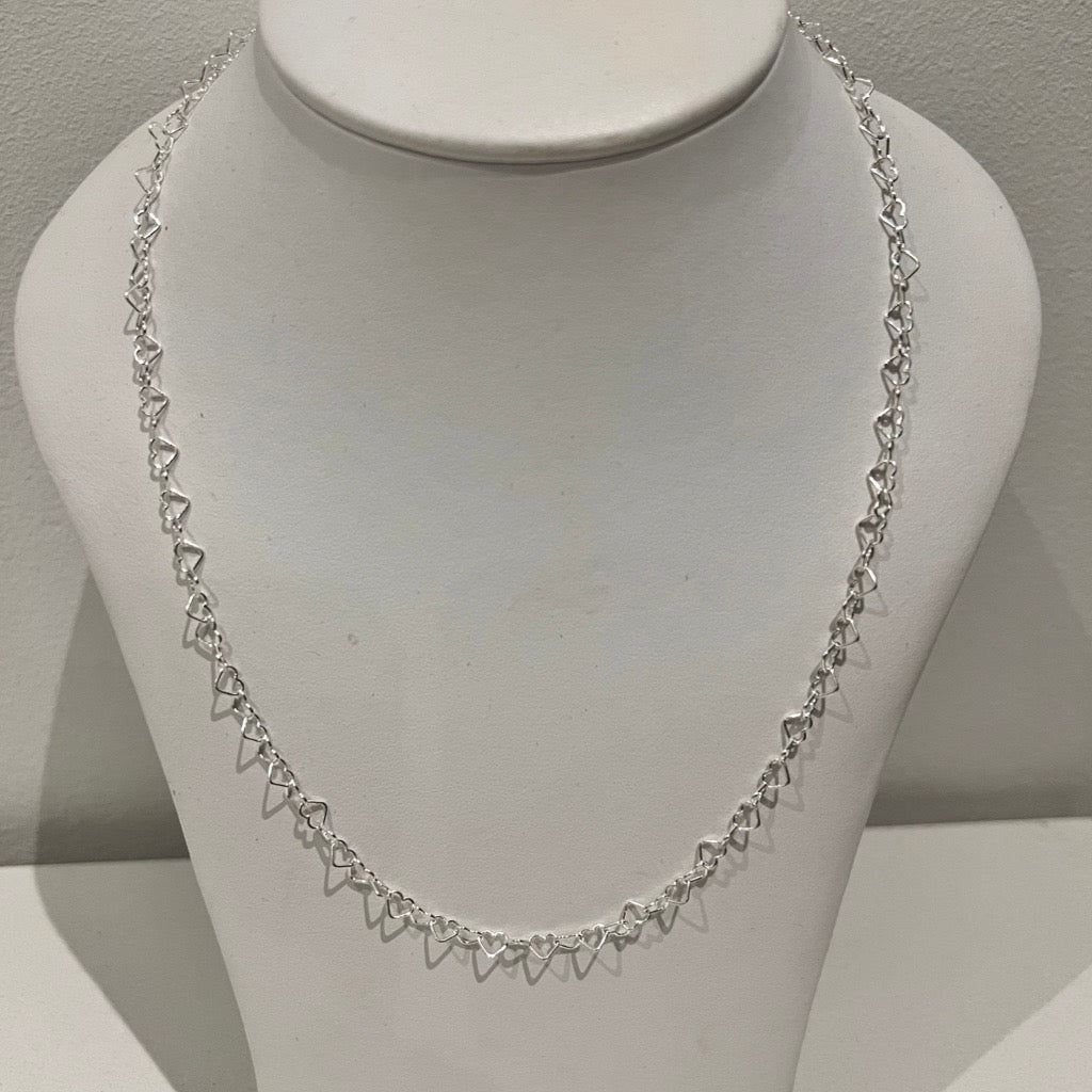 intricate silver hearts linked together Necklace