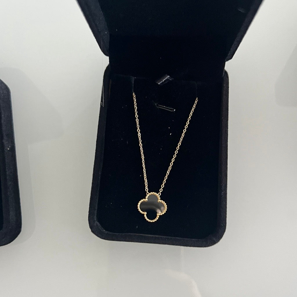 black and gold single clover necklace