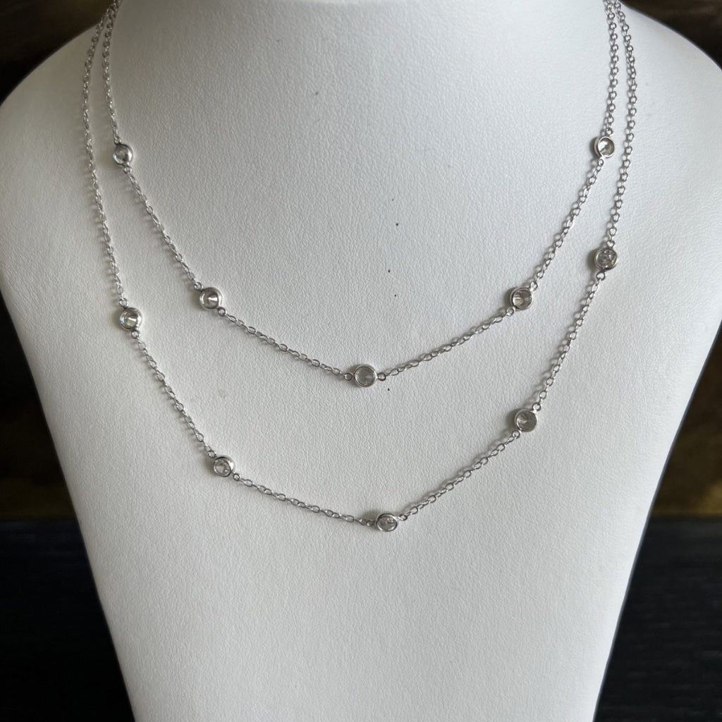 9kt white gold by the yard necklaces with cubic zirconias in a bezel setting