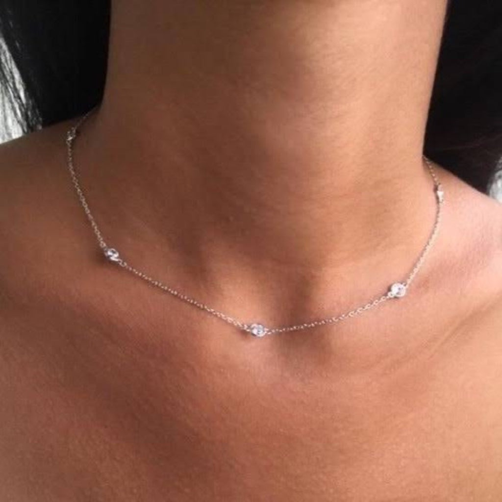 9kt white gold by the yard necklaces with cubic zirconias in a bezel setting