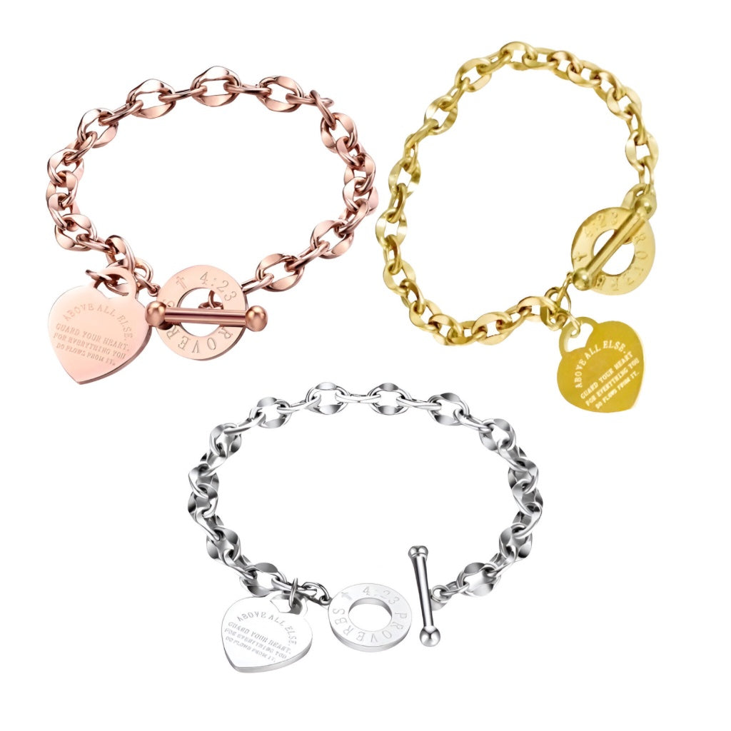 rose, yellow and silver charm bracelet with proverb inscribed on the heart