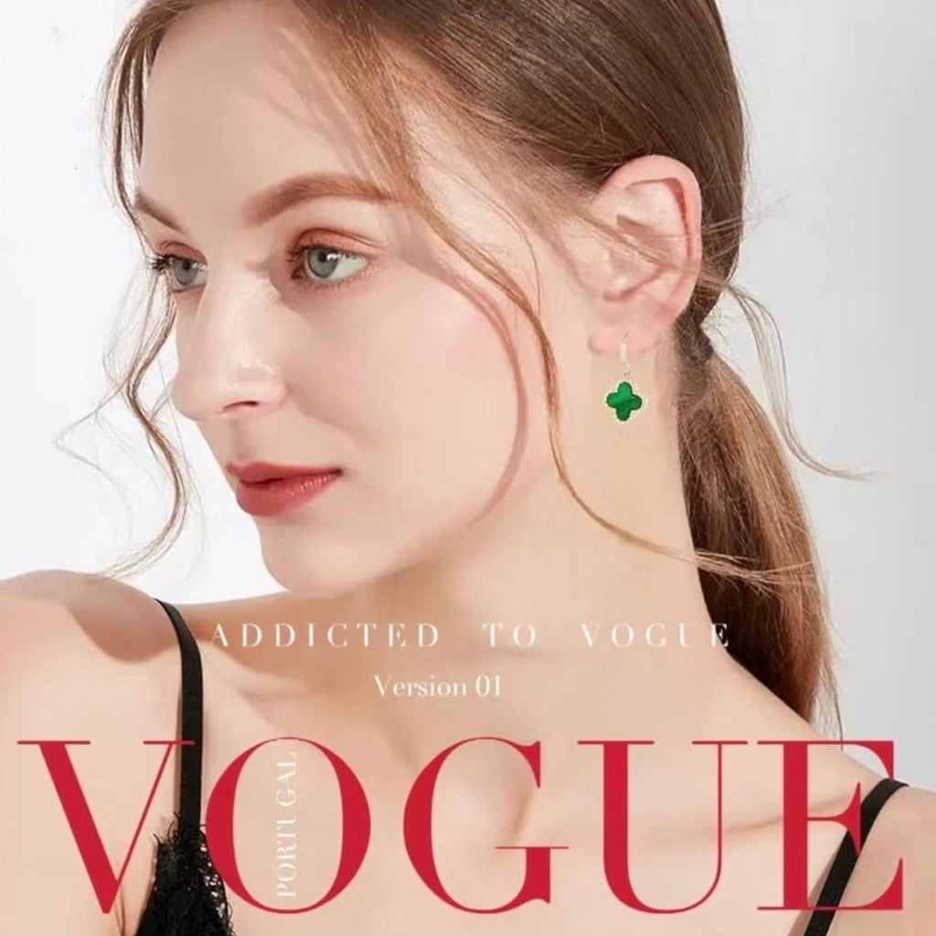 clover earrings green and gold on magazine cover 