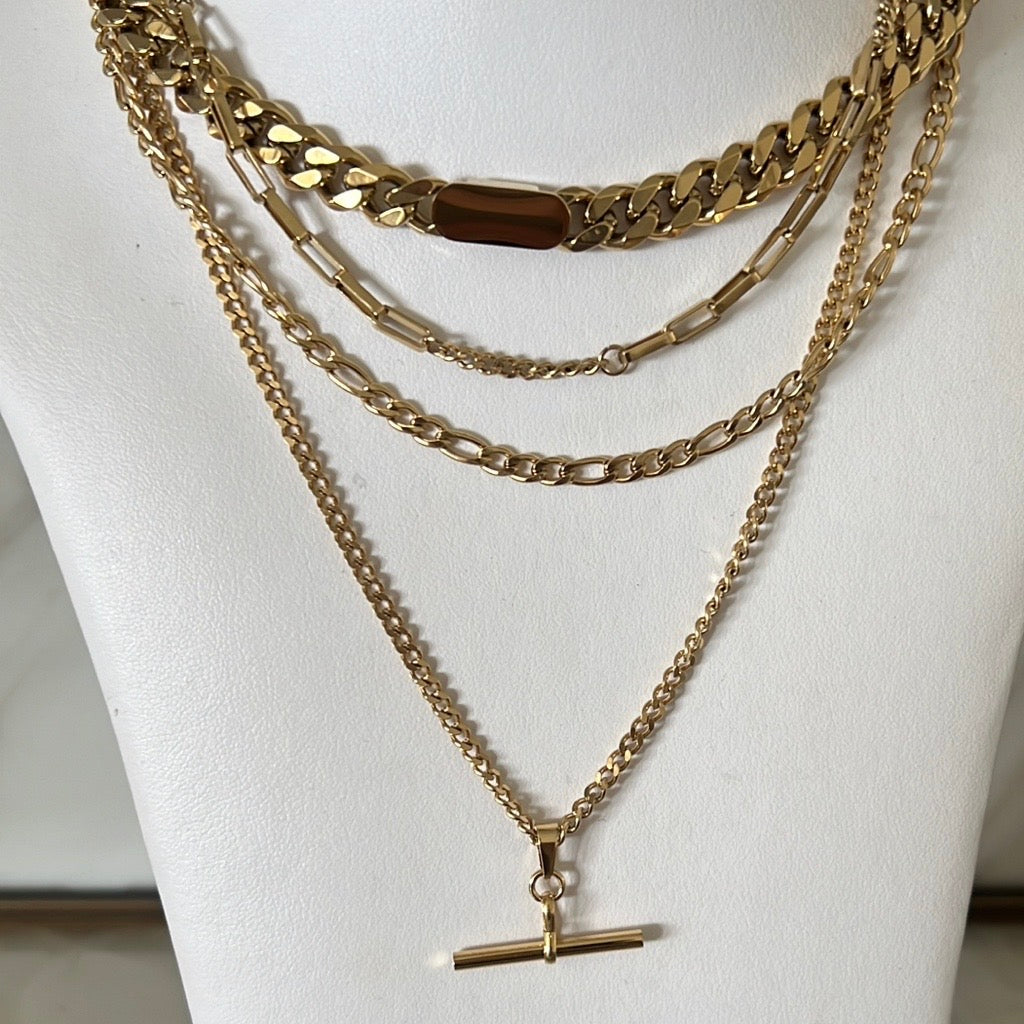 layered necklaces in gold