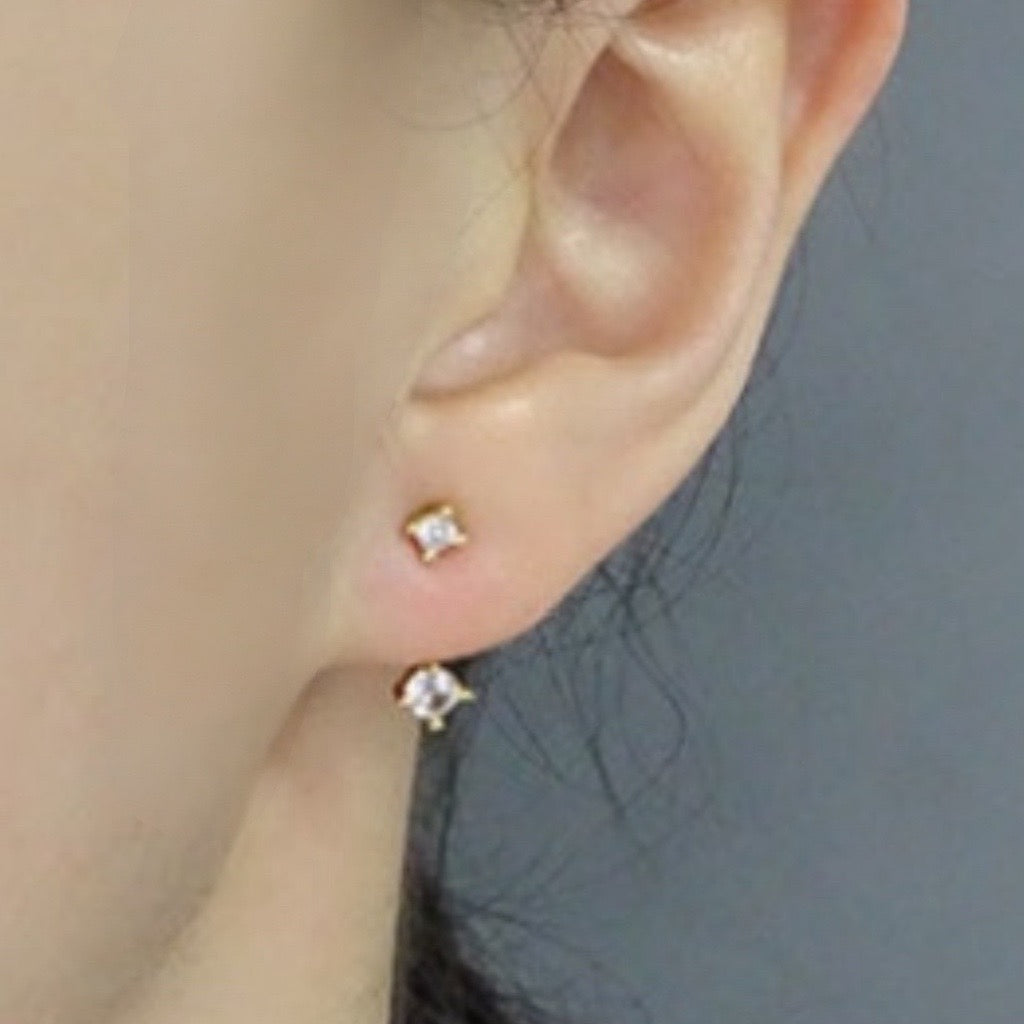 front and back single stud with cubic zirconias top and bottom