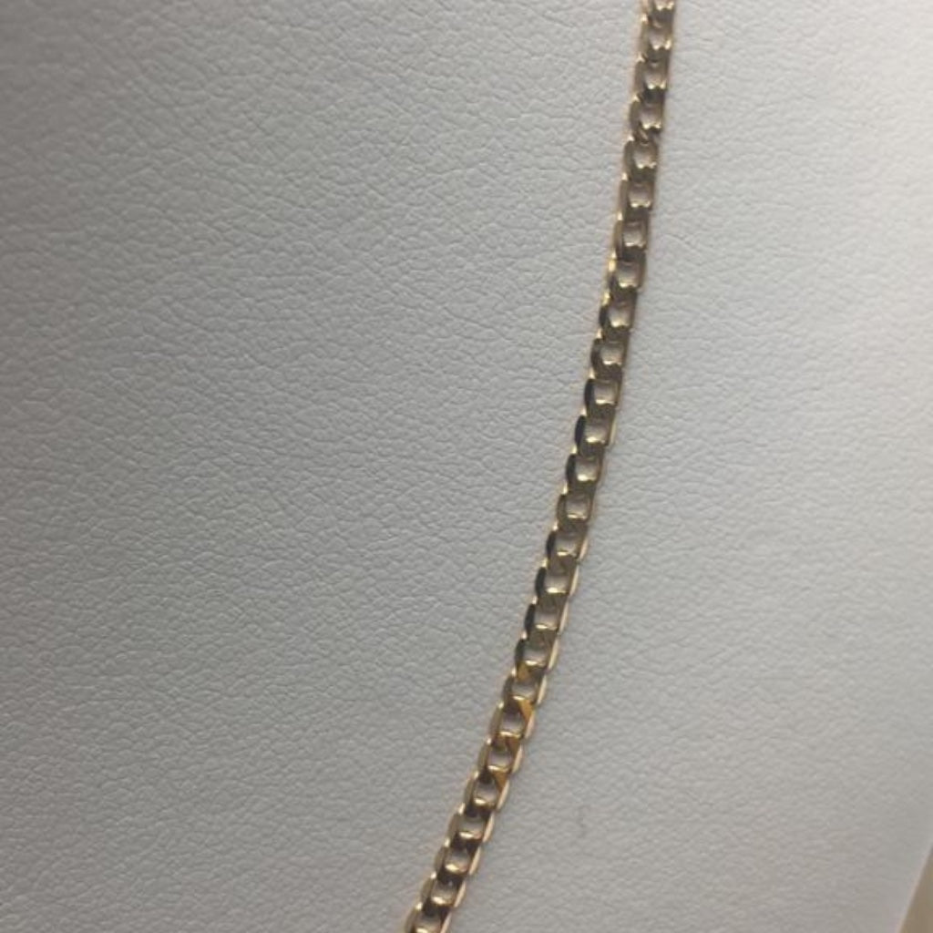 light flat curb necklace in 9kt yellow gold close up 