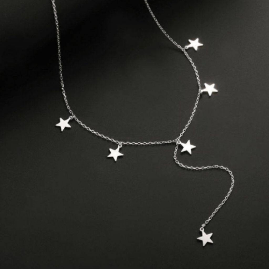 silver lariat necklace with star charms