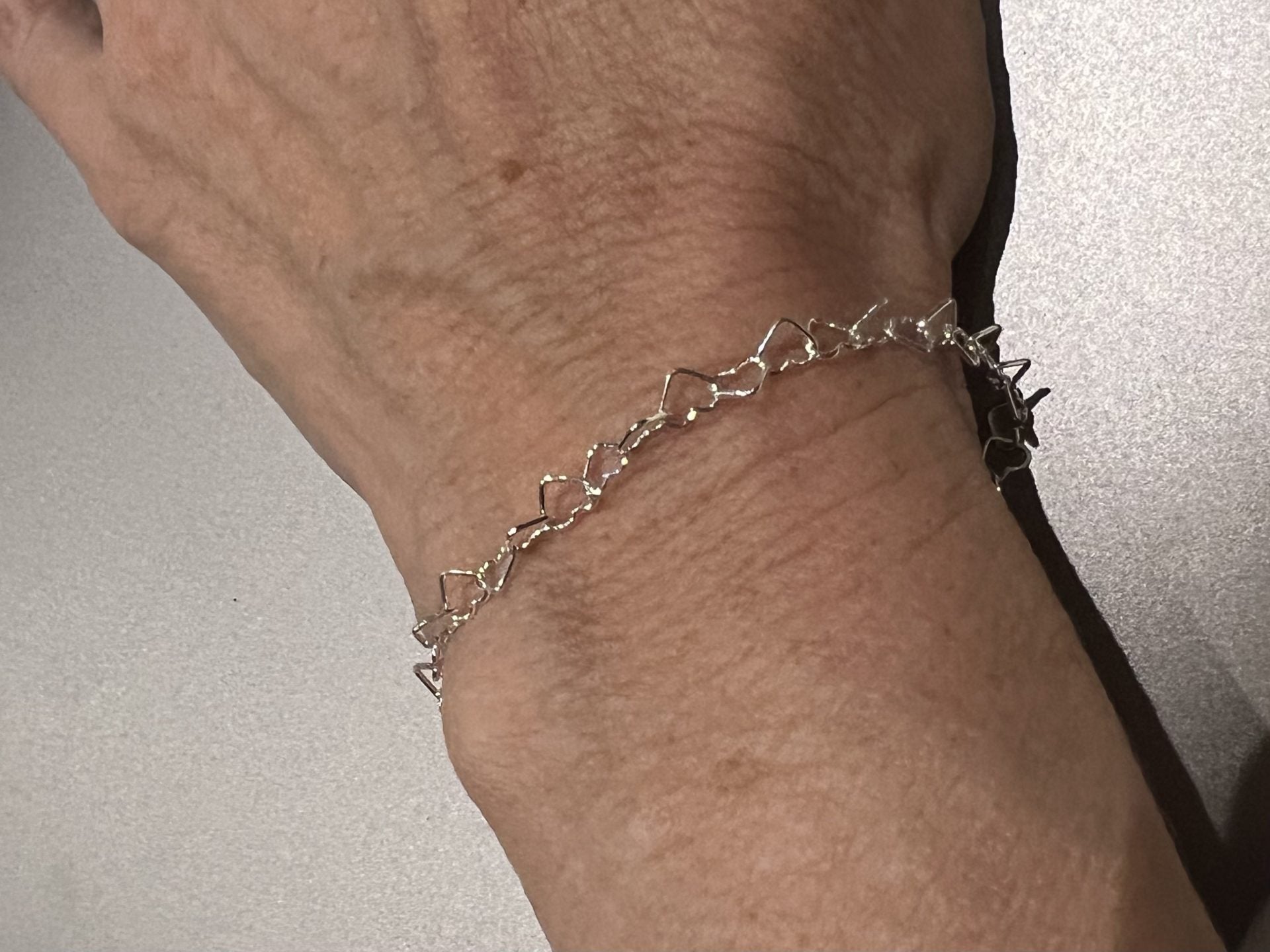 silver hearts linked bracelet