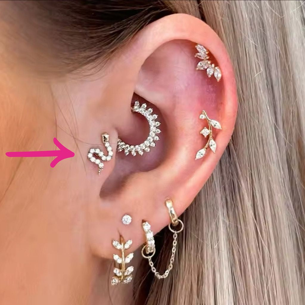 snake screwback earring in models ear
