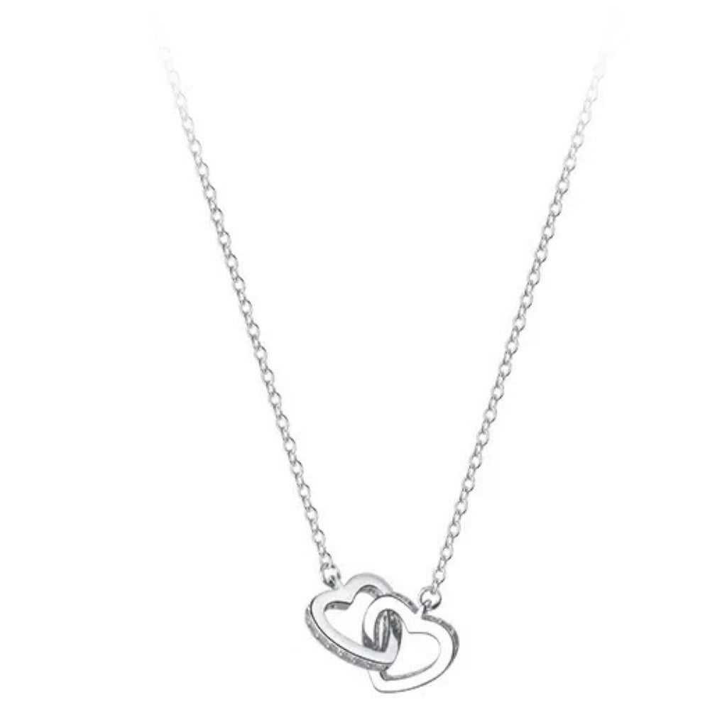 twin hearts necklace in silver